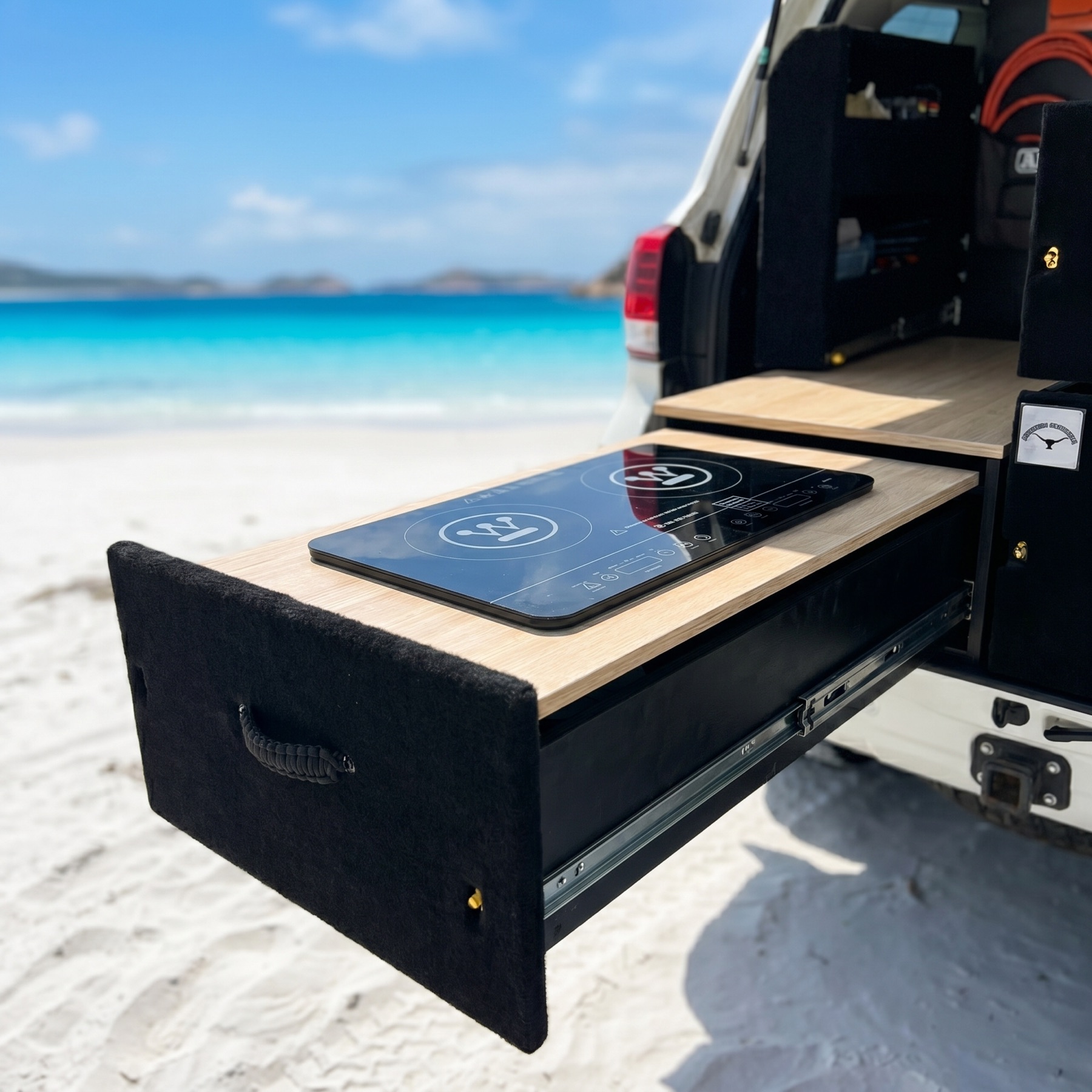 Slide-out cooktop drawer